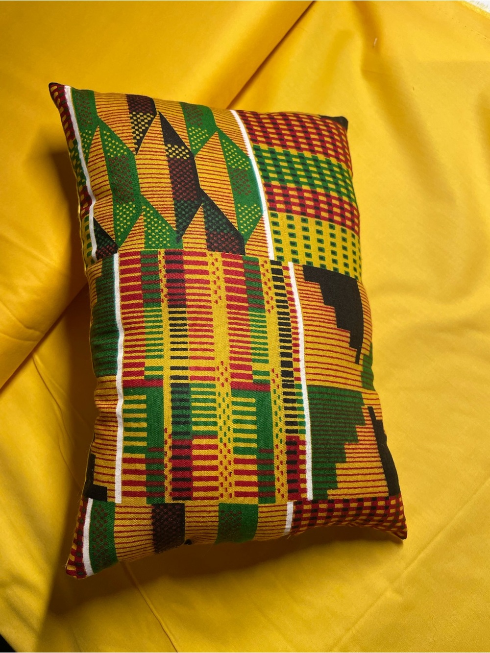 Handmade (by me ) African Print Accent Pillow featuring
10"×7" size